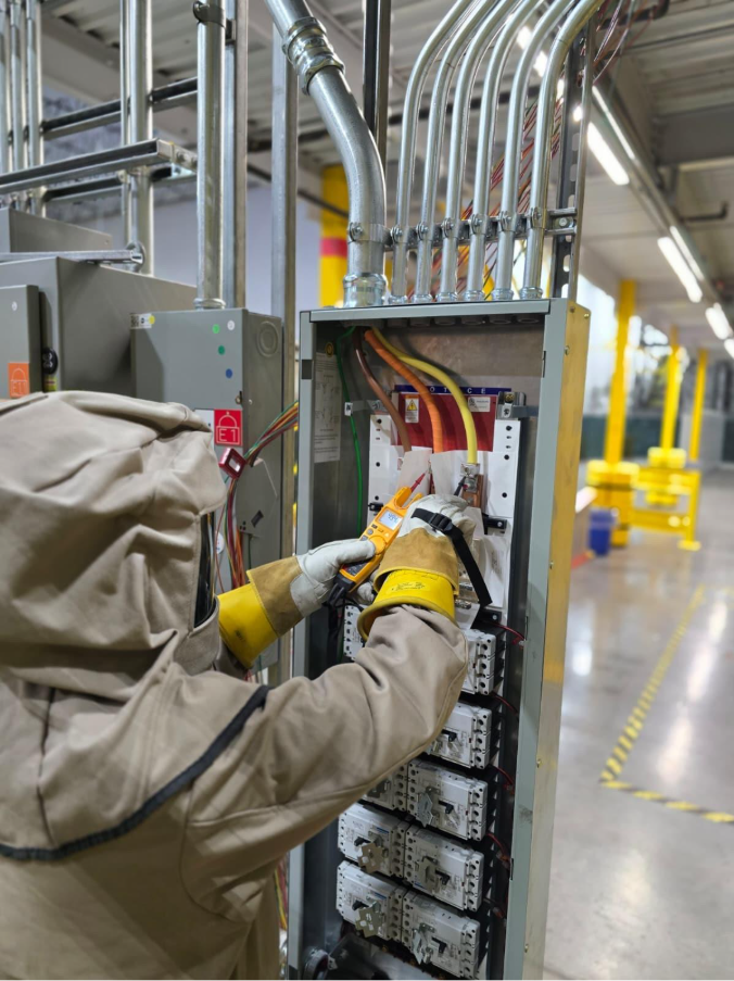 A person working on a machine
AI-generated content may be incorrect.