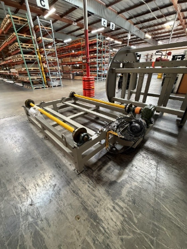 A large warehouse with a large metal frame

AI-generated content may be incorrect.