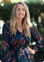 A person with blonde hair wearing a blue dress

AI-generated content may be incorrect.