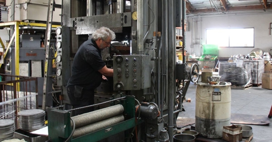 man working on an industrial equipment