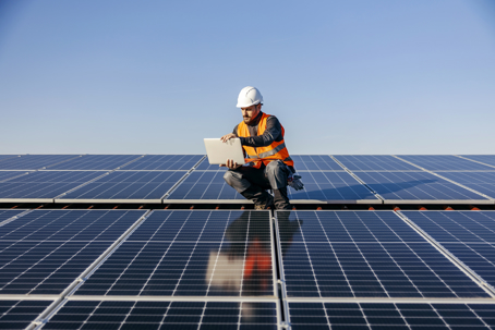 electrician checking solar panel