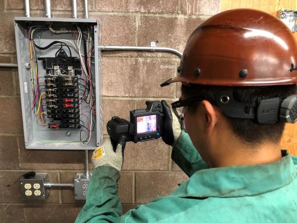 An SIE Tech administering an Infrared Scan